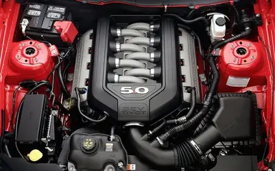 2011-ford-mustang-GT-engine-in-engine-bay.webp