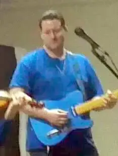 Brandon & Guitar adjusted.webp